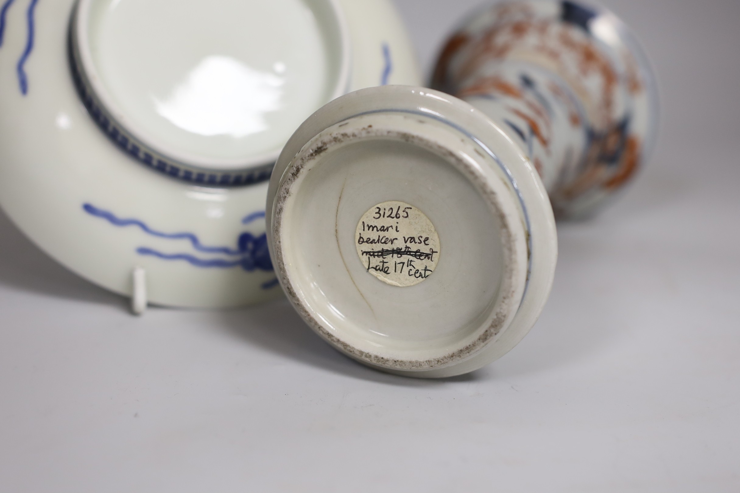 A late 17th century Japanese Imari vase and an Arita dish, vase 18cm